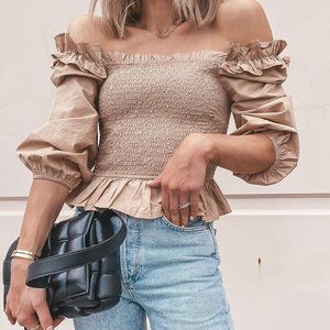 The drop long sleeve ruffle smocked cropped top